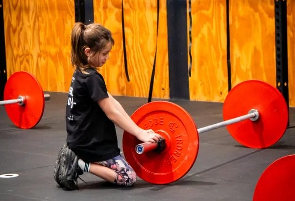Innerbloom CrossFit Kid Setting up Barbell