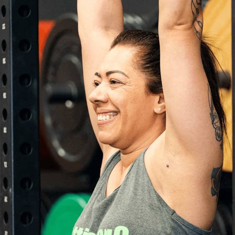 woman lifting weights at Innerbloom CrossFit